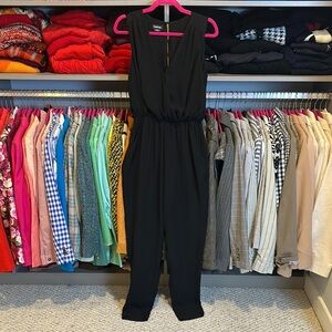 Bebe black v neck sleeveless 2 pocket jumpsuit size XS